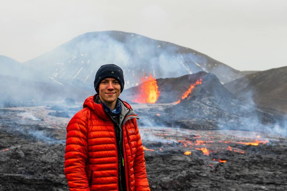 Matt Villante posing in front of a volcano 2